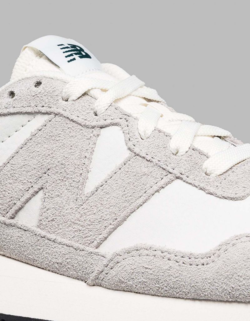 Ropa-TenisNewBalanceHombre-refMS237ST-Wiseman-3.jpg